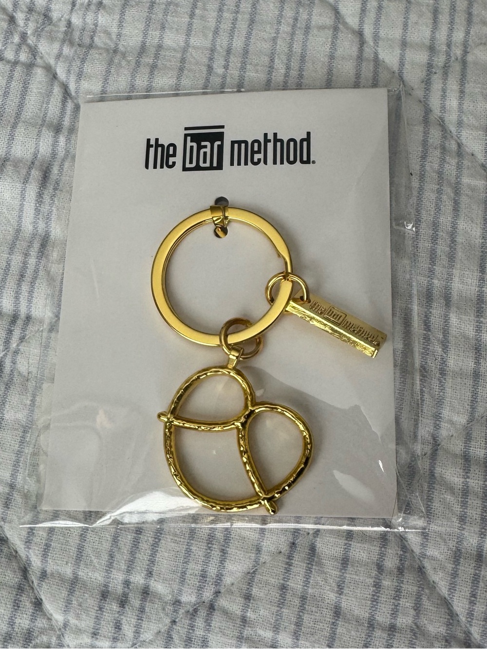The Bar Method Gold Pretzel Keychain — NWT 🥨